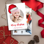Cartão De Festividades Foto Feliz de Natal Santa Hat<br><div class="desc">Celebre a temporada com nossos cartões com fotos de Feliz Natal com tipografia bonitinha e uma simples vibração de feriado familiar! Projetados com um toque minimalista e elementos engraçados, essas cartas exibem uma paleta vermelha festiva, chapéus de Papai Noel e temas lúdicos do Polo Norte. Com adoráveis sotaques de elfos...</div>
