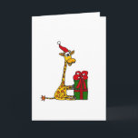 Cartão De Festividades Funny Giraffe in Santa Hat Christmas Design<br><div class="desc">Wonderful funny giraffe wearing a Santa hat and opening a Christmas present original Christmas art.  Can also add custom text and change background color when ordering.</div>