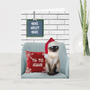 Cartão De Festividades Gato Siamês de Natal em uma Cadeira