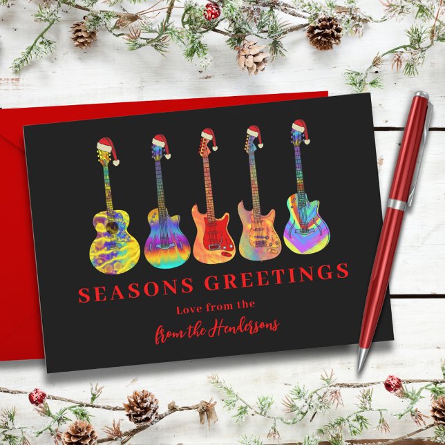Cartão De Festividades Guitarras de Natal em Chapéus de Papai Noel Saudaç (Cool music seasons greetings colorful guitars wearing Santa hats red and black holidays card)