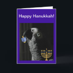 Cartão De Festividades Hanukkah, Cinza africana do Congo<br><div class="desc">Diversão design de um Popote Cinza Africano do Congo segurando um Dreidel ao lado de um Menorah para o Feriado Judeu.</div>
