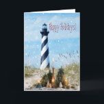 Cartão De Festividades Hatteras Lighthouse Beach Christmas - Holiday Card<br><div class="desc">Uma exibição tradicional de velas e árvores de férias artísticas em um cobertor na areia,  em frente ao Farol de Cabo Hatteras. Personalizar todo o texto.</div>
