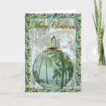 Cartão De Festividades Hawaiian Beach Christmas Card<br><div class="desc">A perfect card for tropical enthusiasts. Recipients will certainly enjoy this beautiful beach scene magnified within an ornament. The garland trim enhances the perfect Hawaiian beach! Customize the card by removing the inside text and adding your own or just add your signatures and your done. Happy Holidays!</div>