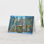 Cartão De Festividades Hope Love Light Holiday Card<br><div class="desc">Este cartão festivo apresenta uma menorah,  árvore de Natal,  gazebo e luzes de férias aquecidas colocadas dentro de uma romântica,  cidade grande da Terra do Inverno. A mensagem interior diz "Desejos mais quentes para uma temporada de férias cheios de esperança,  amor e luz."</div>