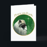 Cartão De Festividades Keeshond Peace<br><div class="desc">Peace on Earth. Show your reason for the season with your Keeshond in this unique dog design accented with green and gold. Goes great on an ornament,  greeting card or sticker.</div>