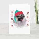 Cartão De Festividades Keeshond Santa Paws<br><div class="desc">Your favorite Christmas dog plays Santa Claus ~ or Santa Paws. This fun design of AKC dog breed,  Wire Keeshond,  makes a unique Christmas gift on a t-shirt,  ornament,  greeting card,  mug,  sticker and much,  much more!</div>