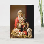 Cartão De Festividades Kneeling Santa<br><div class="desc">The kneeling Santa,  adoring the Christ Child,  is one of my favorite Christmas images. I've coupled it with Santa's prayer inside the card. I think this would make a very special greeting to friends and family during this sacred season of the year.</div>