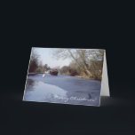 Cartão De Festividades Narrowboat on a frozen canal<br><div class="desc">A Christmas or New Year card with a photo of a vintage traditional large Woolwich narrowboat Aber breaking through the ice on the Grand Union Canal in the UK,  with a swan walking on the ice and a lock in the background.</div>