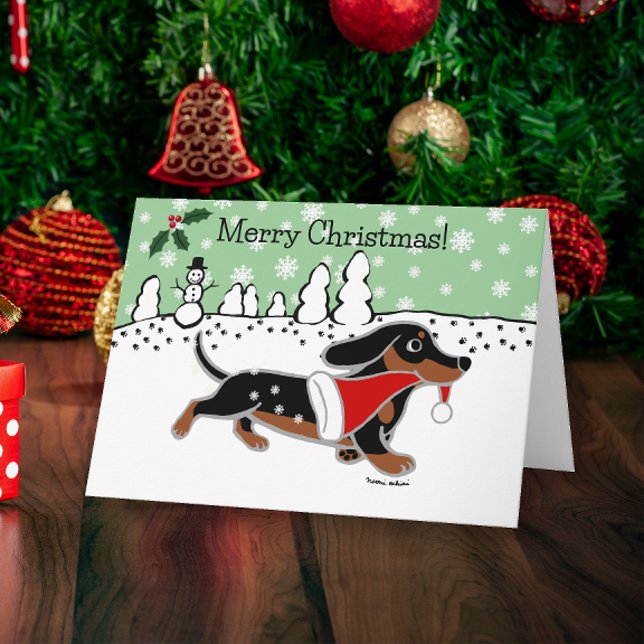 Cartão De Festividades Natal em flocos de neve em preto e latão (Black and Tan Dachshund Running Snowflakes Design Christmas Cards for Dachshund Owners.)