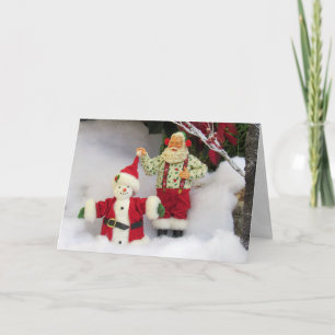 Cartão De Festividades Papais noeis constroem um boneco de neve!