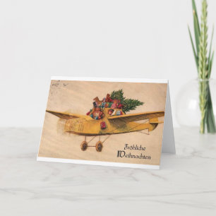 Cartão De Festividades Papais noeis de avião - brinquedos - Alemanha 1900