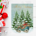 Cartão De Festividades Papais noeis Presentes em seu Carro Árvores de Nev<br><div class="desc">Papais noeis maravilhosos em seu carro navegando pela neve com todos os belos presentes esperando para serem distribuídos. Árvores com neve colocam a palco para o pano de fundo e uma mensagem de Natal Merry dourada. Personalize nas costas num charmoso quadro de férias.</div>