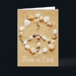 Cartão De Festividades Peace on Earth Seashell Peace Sign Card<br><div class="desc">Peace on Earth! Seashells in the shape of a peace sign on a sandy beach. Totally customizable for you to personalize as you please! Perfect for a Christmas card or for any occasion!</div>