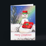 Cartão De Festividades Presente de Natal de Snowman<br><div class="desc">Um cartão de saudação de Natal com a minha imagem original de um boneco de neve sorridente segurando um presente de Natal no dia de Natal.</div>