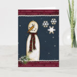 Cartão De Festividades Primitive Snowman Christmas Greeting Card<br><div class="desc">Primitive Christmas greeting card with a snowman reliaxing in the night sky with the snow flakes falling..</div>