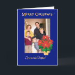 Cartão De Festividades Red Poinsettias Christmas Photo Across the Miles<br><div class="desc">A bright, festive Christmas card 'Across the Miles' to personalise on the front cover with your own photo. The design includes a gold-effect pot of Bright Red Poinsettias on a Deep Blue background from a hand-painted paper collage by Judy Adamson. You also can change the inside message if you wish....</div>