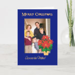 Cartão De Festividades Red Poinsettias Christmas Photo Across the Miles<br><div class="desc">A bright, festive Christmas card 'Across the Miles' to personalise on the front cover with your own photo. The design includes a gold-effect pot of Bright Red Poinsettias on a Deep Blue background from a hand-painted paper collage by Judy Adamson. You also can change the inside message if you wish....</div>