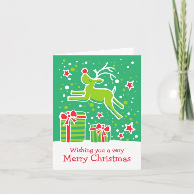 Cartão De Festividades Reindeer prancing over gifts green Christmas card (Frente)