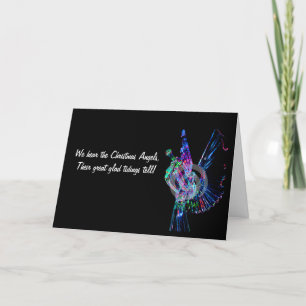Cartão De Festividades Retrata um anjo iluminado soprando uma trombeta