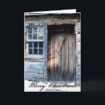 Cartão De Festividades Rustic Log Cabin Rustic Country Christmas Card<br><div class="desc">A rustic log cabin door, decorated with a primitive stocking welcomes the holiday season. The inside verse wishes an old fashioned country christmas. You can easily change the verse inside or leave as is. Just add your family or business information. Very Prim! Great for personal or business. Postcards will be...</div>