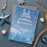 Cartão De Festividades Santa Claus Sleigh e Reindeer voando no céu<br><div class="desc">Entra no espírito festivo com este cartão de Natal maravilhoso! Imaginem Papais noeis a brilhar sobre uma cidade cintilante, assoprados com flocos de neve contra um céu azul sonhador. É como um traço de magia em cada dobra! Compartilhe os momentos de alegria e feliz dos feriados com este cartão delicioso....</div>