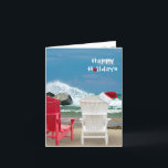 Cartão De Festividades Santa hat on beach chair<br><div class="desc">red and white beach chairs with Santa cap and waves crashing on rocks</div>