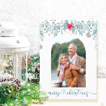 Cartão De Festividades Script Elegante de Foto do Arco de Folhagem da Flo<br><div class="desc">Cartão de natal simples e elegante com sua foto e saudação personalizada. Feliz natal é escrito em tipografia elegante de script na frente e você pode personalizar a dentro de mensagens. O modelo fotográfico mostrará a sua imagem em forma de arco, emoldurada com poinsettia de aquarela e folhagem de inverno...</div>