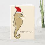 Cartão De Festividades Seahorse Santa Christmas<br><div class="desc">Send your warmest seaside wishes this Season with these Seahorse Santa Christmas holiday cards. The cards feature a cute seahorse in a Santa hat with the words "Happy Holidays" on the front and "Warmest wishes this Holiday Season" on the inside. Personalize as much as you wish. All text is fully...</div>