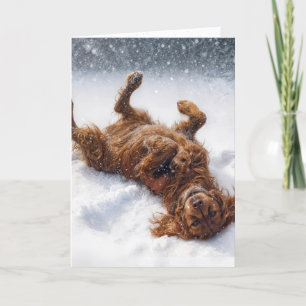 Cartão De Festividades Setter Irlandês de Natal Fazendo um Anjo de Neve