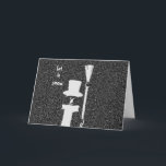 Cartão De Festividades Snowman Christmas Card<br><div class="desc">An illustration of a black snowman holding a broom on a snowy night with the words "let it snow."</div>