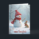 Cartão De Festividades Snowman De Natal Com Bunny<br><div class="desc">Um boneco de neve vestindo um chapéu vermelho e um cachecol se posiciona alegremente ao lado de um pequeno coelho,  também calorosamente vestido,  cercado por uma paisagem nevada com queda de neve suave. O texto pode ser alterado.</div>