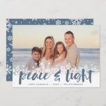 Cartão De Festividades Snowy Peace | Foto de Hanukkah<br><div class="desc">Cartões com fotos modernos de Chanucá apresentam sua imagem favorita com uma borda branca de flocos de neve ao longo da parte inferior. "Paz e luz" aparece em slate,  azul,  escrito com letras de pincel,  com seus nomes e o ano abaixo.</div>