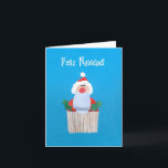Cartão De Festividades Spanish Christmas 'Cupcake with Santa' Card<br><div class="desc">A smaller sized Spanish Christmas Card with a Santa on top of a cupcake,  from a handpainted paper collage by Judy Adamson. Please contact me through my store if you would like the front cover text changed and the inside is left blank for your own message.</div>