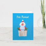 Cartão De Festividades Spanish Christmas 'Cupcake with Santa' Card<br><div class="desc">A smaller sized Spanish Christmas Card with a Santa on top of a cupcake,  from a handpainted paper collage by Judy Adamson. Please contact me through my store if you would like the front cover text changed and the inside is left blank for your own message.</div>