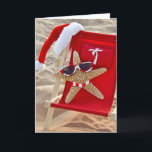 Cartão De Festividades Starfish in beach chair with Santa hat<br><div class="desc">Starfish wearing sunglasses and bikini in red beach chaise with Santa Claus hat at the beach</div>