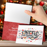 Cartão De Festividades Tipografia Feliz de Natal Dobrada<br><div class="desc">Feliz Natal em uma fonte divertida,  realçada por itens de feriado,  destaca a frente desses cartões de saudação de Natal dobrados com sua foto favorita,  saudação e personalização no dentro. CORRESPONDENTE a itens na nossa coleção.</div>