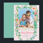 Cartão De Festividades Tropical Floral Christmas Pink Photo Holiday Card<br><div class="desc">This lovely tropical holiday photo card sends warm wishes to your loved ones. The island-theme Christmas photo card is the perfect way to showcase your vacation photos, or for those who live in warm locales or tropical areas. Watercolor flowers and leaves frame your favorite photo, with rose pink text below...</div>