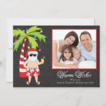 Cartão De Festividades Tropical Santa Christmas Holiday Family Photo Card<br><div class="desc">Trendy & Popular Chalkboard tropical hawaiian santa warm wishes family photo christmas card featuring a cute lounging santa under a palm tree decorated with christmas lights and ornaments set on a stylish blackboard modern chalkboard background.. Just personalize with your information and add a photo of your beautiful family and you...</div>