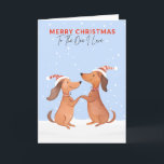 Cartão De Festividades Um Eu Adoro Feliz Natal Dachshances De Salsicha Cã<br><div class="desc">Um cartão festivo de Natal com uma ilustração de dois pratos bonitos na neve,  em estilo aquarela. A saudação "Feliz Natal" está no topo da carta,  em letras maiúsculas,  seguida de "Ao Que Eu Amo",  na tipografia da escrita. A mensagem dentro do cartão é "Feliz Natal".</div>