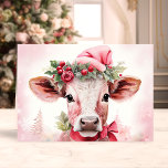 Cartão De Festividades Vaca de Natal Adorável em Santa Hat<br><div class="desc">Espalhe a alegria de férias com nossa Adorável Vaca de Natal no Cartão de Férias Santa Hat! Esta carta encantadora apresenta uma doce ilustração de uma vaca fofa vestindo um chapéu festivo de Santa, colocado sobre um fundo macio e nevado com delicadas decorações de férias. Perfeito por compartilhar desejos alegres...</div>
