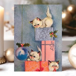 Cartão De Festividades Vintage Christmas Kittens and Gifts<br><div class="desc">Vintage Christmas Kittens and Gifts Holiday Card . This design features three kittens playing on a tower of Christmas Gifts. What a beautiful retro holiday scene. Personalize this custom design with your own inside greeting.</div>