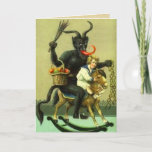 Cartão De Festividades Vintage Krampus Card<br><div class="desc">Krampus Christmas cards for those of you that probably aren't on the Nice list! Krampus is the one who comes and gathers the bad children at Christmas time. He grabs them, puts them in his basket and takes them back to his "evil lair" for his dinner. He doesn't stop at...</div>