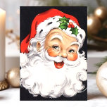 Cartão De Festividades Vintage Papai Noel Face Natal<br><div class="desc">Vintage Papai Noel Enfrenta O Cartão De Férias De Natal. Este design apresenta um Papai Noel sorridente em um fundo preto. Que bela cena de férias retrógradas. Personalize este design personalizado com a sua própria saudação de dentro.</div>