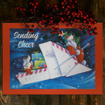 Cartão De Festividades Vintage Santa Claus em Paper Sleigh Flat Christmas<br><div class="desc">**Vintage Papai Noel em Paper Sleigh Flat Christmas Card** Este charmoso cartão de saudação de Natal apresenta uma ilustração antiga de Papai Noel e seu amigo coelho navegando pelo céu. Eles estão voando em um trenó de papel, que parece ser feito de um envelope postal. O texto na frente do...</div>