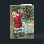 Cartão De Festividades Vintage Santa Trimming Tree Christmas Card<br><div class="desc">Vintage / Retro / Victorian Santa Christmas card.  Santa trimming the Christmas tree!  Santa decorating the Christmas tree!  A Merry Christmas!</div>