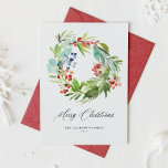 Cartão De Festividades Watercolor Juniper e Holly Wreath Christmas<br><div class="desc">Feliz Natal! Envie sua mensagem de feriado para a família e amigos com este cartão festivo de Natal com aquarela. Apresenta uma camada aquosa de bagas de inverno e verde. Personalize este cartão de feriado botânico com seus detalhes. Este cartão natalino de aquarela está disponível em outros estoques de cartão....</div>