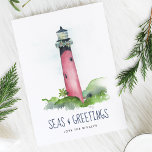 Cartão De Festividades Watercolor Lighthouse Florida Beach Christmas<br><div class="desc">Este cartão de Natal do tema Costeiro apresenta minha mão original pintada com aquarela Júpiter, farol da Flórida em tons de vermelho em um fundo branco nítido. As palavras "Seas" e "Saudações" são definidas numa tipografia moderna com escrita de pincel em azul marinho. O dentro apresenta uma cor azul sólida...</div>