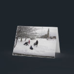 Cartão De Festividades Winter Sledding Jersey City<br><div class="desc">A family of 4 enjoys sledding in a snow-covered Pershing Field park in Jersey City, New Jersey, with a church visible in the background. Great for a Christmas card. Customizable - add your own message with the Add Text tool</div>