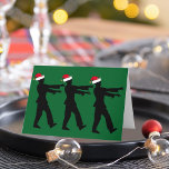 Cartão De Festividades Zombie Papais noeis Engraçados Humor de Natal Verd<br><div class="desc">Zumbis em chapéus de Papai Noel vermelho andando na fila com braços de morto ou esticados na frente deles. Um cartão verde engraçado para um fã de horror neste Natal.</div>