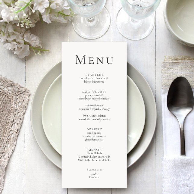 Cartão de Menu de Casamento de Tipografia Minimali (Modern Minimalist Typography Wedding Menu Card on a silver grey wedding table with white flowers)